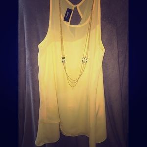 Yellow Sleeveless blouse with attached necklace